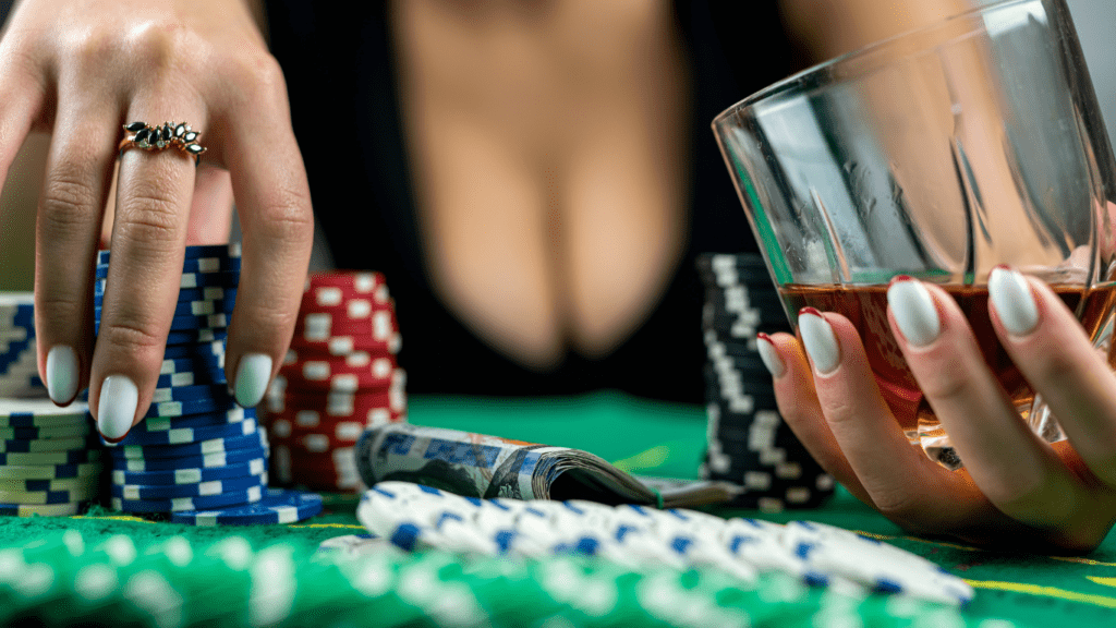 Holding a glass of wine and casino chips